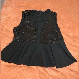 Black sequin and mesh peplum top